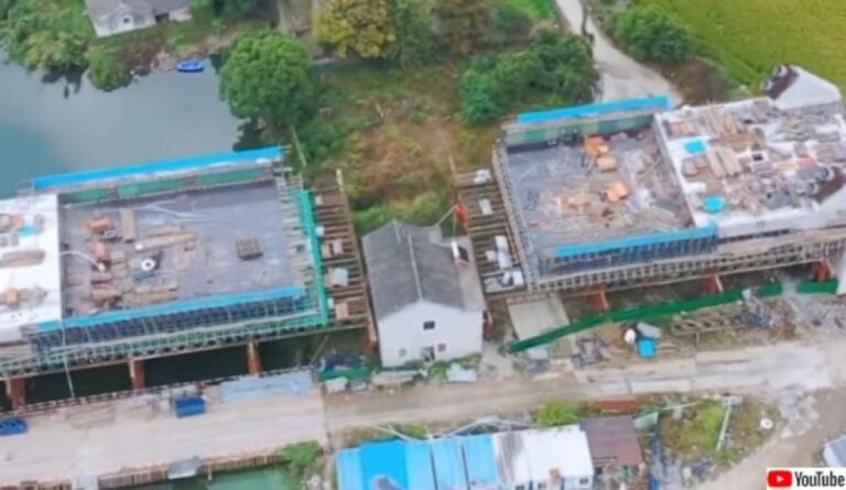 立ち退き拒否。高速鉄道の路線に挟まれた状態で残る「釘の家」